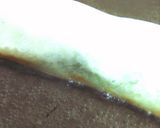 A picture of step 6 of Chicken Spring Rolls with Salt-Cured Plum and Shiso Leaf.