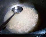 A picture of step 3 of Chicken soup with chicken sticks.