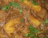 A picture of step 10 of Curried Sweet Potatoes in Coconut Milk.