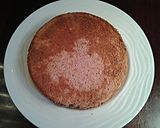 A picture of step 16 of Fresh Strawberry Chiffon Layer Cake with Chocolate and Strawberry Whipped cream.