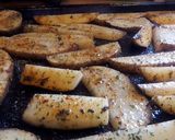 A picture of step 3 of Baked Herb Fries.