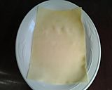 A picture of step 5 of Sausage Pasta Rollatini.
