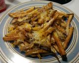 A picture of step 9 of Home made cheese fries.