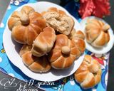 A picture of step 16 of Pumpkin shaped dinner rolls.