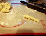 A picture of step 12 of Bosnian Crescent Rolls.