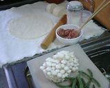 A picture of step 5 of Easy and Delicious Crispy Pizza.