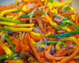 A picture of step 5 of Keto Wors and Sweet Peppers.