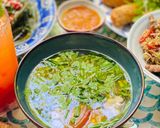 Hình bước làm 4 của món Canh Mọc Nấu Cà Chua
