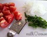 A picture of step 2 of Tomato and New Harvest Onion Salad.