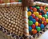Foto del paso 4 de la receta: Torta de las 20 cucharadas con golosinas y muchísimo color