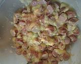 A picture of step 5 of Hotdogs with rice casserole II.
