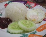 A picture of step 4 of Nasi Lemak (Rice Cooked in Coconut Milk).