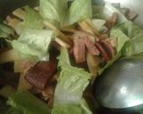 A picture of step 4 of Pork with bamboo shoots.