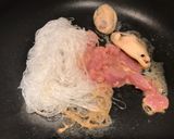 A picture of step 2 of Super Healthy Cellophane noodles with shrimps mussels pork fried vegetables.