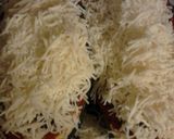 A picture of step 10 of Audrey's Italian Stuffed Zucchini.