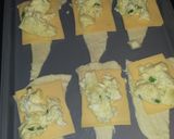 A picture of step 4 of Buttery croissant filled with green onion egg and cheese mixture.
