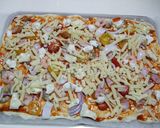 A picture of step 6 of Our Family's Easy Recipe For Pizza To Serve To Guests.