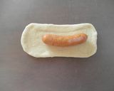 A picture of step 4 of Dog-Shaped Bread Rolls: Sleeping Dachshund Wiener Sausage Bread.