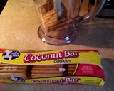A picture of step 1 of Coconut Cheesecake With Chocolate Ganache.