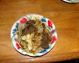 A picture of step 14 of taisen's beef tips with red wine gravy.