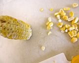 A picture of step 2 of Rice Cooked with Corn.