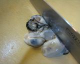 A picture of step 3 of Simple Oyster Ajillo (Simmered in Oil).