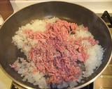 A picture of step 4 of Tomato Keema Curry Using Store-bought Curry Roux.