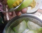 A picture of step 2 of Shorsher puure Chalkumro (Fried ash gourd stuffed with mustard).