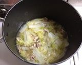 A picture of step 2 of Creamy Milk Soup with Chinese Cabbage and Pork.