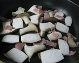 A picture of step 3 of Spinach and King Oyster Mushrooms Sauteed With Butter and Soy Sauce.