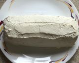 A picture of step 7 of Ginger biscuit log cake.