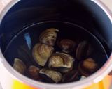 A picture of step 2 of A Classic Dish for Doll's Festival Clear Soup with Nanohana and Hamaguri Clams.