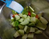 A picture of step 3 of Mix Spicy-Tangy Pickle.