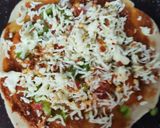A picture of step 4 of Cheesy mexican roti.