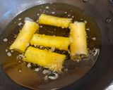 A picture of step 5 of Cheeseburger Spring Rolls.