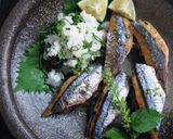 A picture of step 11 of Grilled Pacific Saury Sushi with Black Rice.