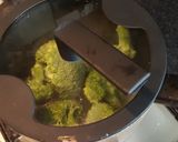 A picture of step 11 of Slow Cooked Shredded Beef. Roast Spuds and Roasted Broccoli.