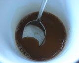 A picture of step 4 of Syrupy and Warming- Hot Brown Sugar and Ginger Drink.