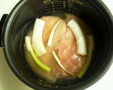 A picture of step 1 of Juicy Boiled Chicken in a Rice Cooker.
