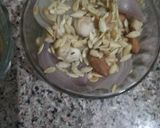 A picture of step 1 of Nawabi paneer korma with white gravy.