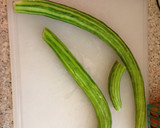 A picture of step 1 of Cucumber and Tomato Salad.