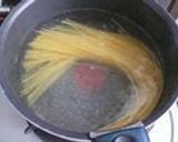 A picture of step 1 of Aglio, Olio e Peperoncino with Bacon.