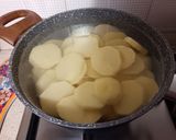 Foto del passaggio 1 della ricetta Tortino di patate e funghi