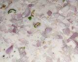 A picture of step 4 of Onion uttapam.