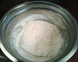 A picture of step 13 of Tiramisu Cream Filled Chocolate Cakes.