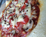 A picture of step 12 of Prosciutto and Mushroom Pizza.