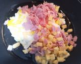 Foto del paso 3 de la receta: Huevos revueltos con jamón y queso