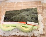 A picture of step 4 of California Rolls with Salmon and Cream Cheese.