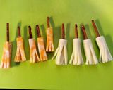 A picture of step 4 of Halloween Witches Broom Stick Treats.