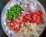 A picture of step 1 of Vegetable broken wheat Khichdi.